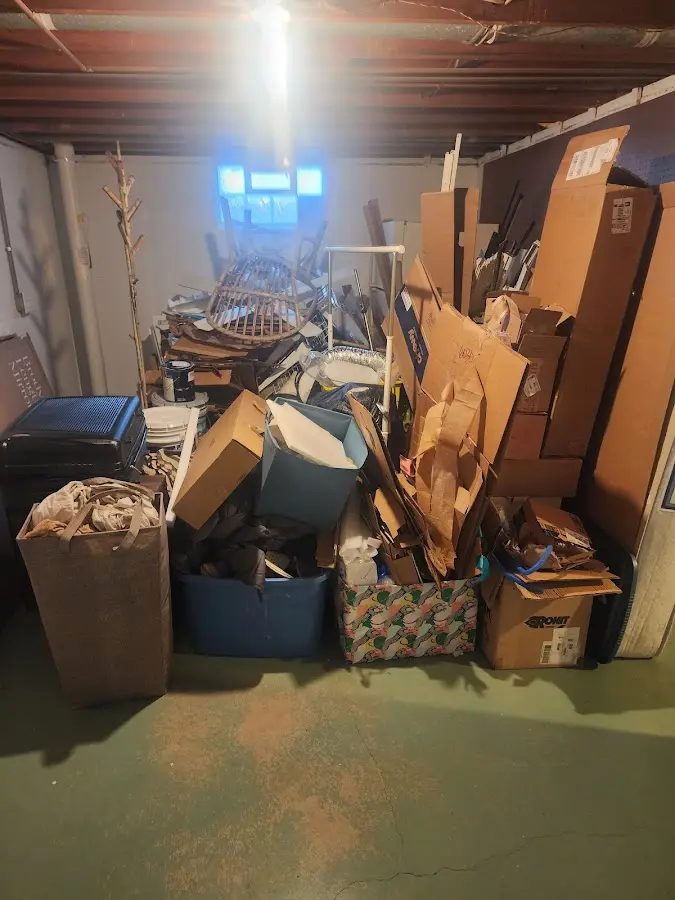 Roll-off dumpster container at job site for 4 Yard Dumpster Rental in East Troy